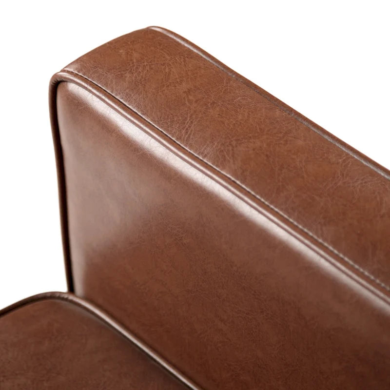 Mervynn, fauteuil inclinable capitonné en similicuir d'inspiration milieu de siècle